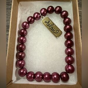 Elegant Purple Beaded Bracelet with Charm